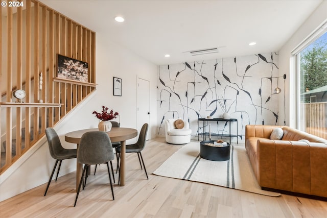 dining area featuring light wood-type flooring