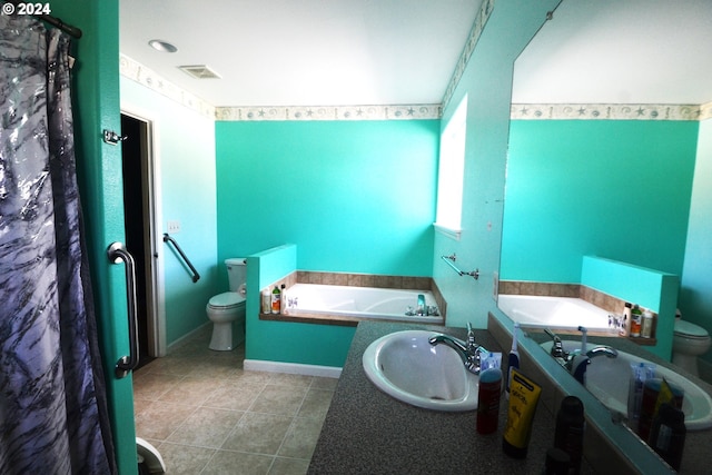 bathroom featuring a tub, sink, tile patterned floors, and toilet