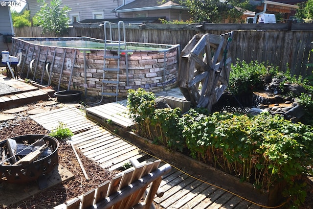 exterior space featuring a wooden deck