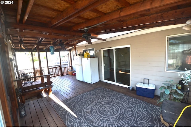 sunroom / solarium with ceiling fan