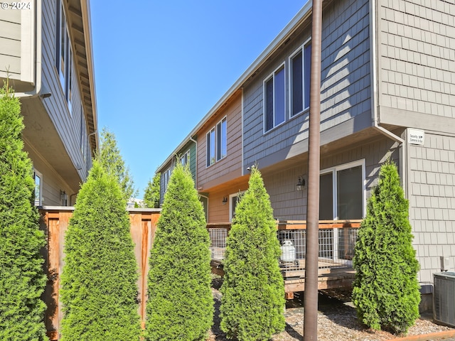 view of property exterior with cooling unit