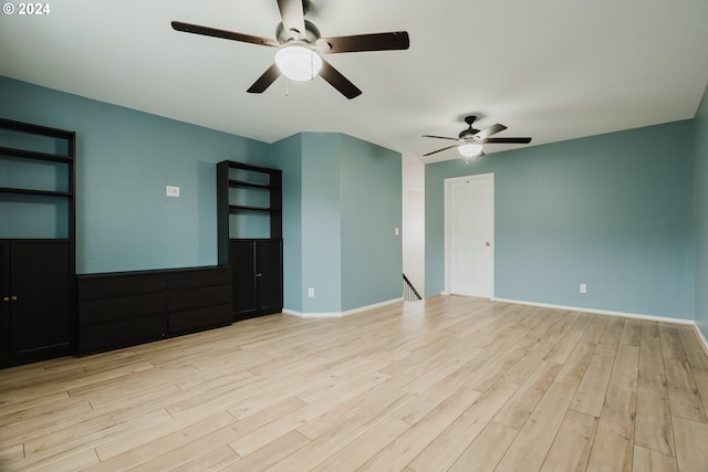 unfurnished room featuring ceiling fan and light hardwood / wood-style floors