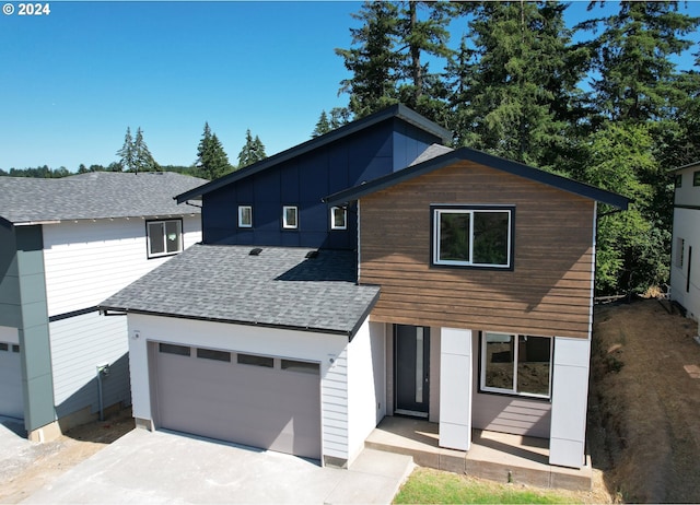 view of front of property with a garage