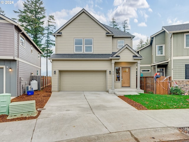 view of front of property featuring a garage