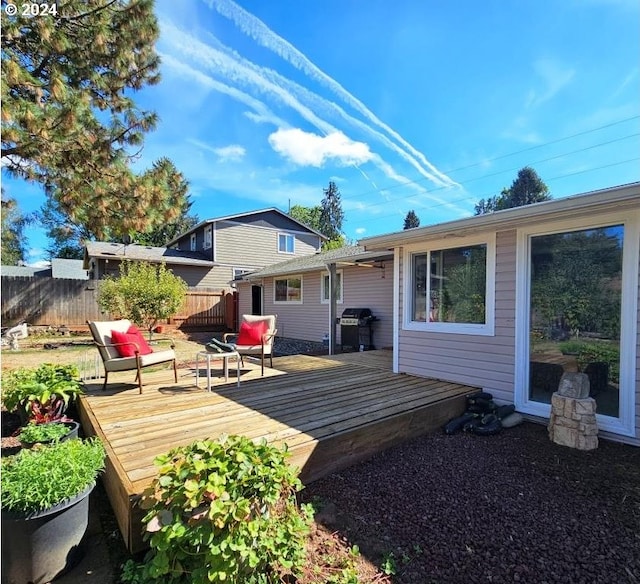 exterior space featuring area for grilling and fence