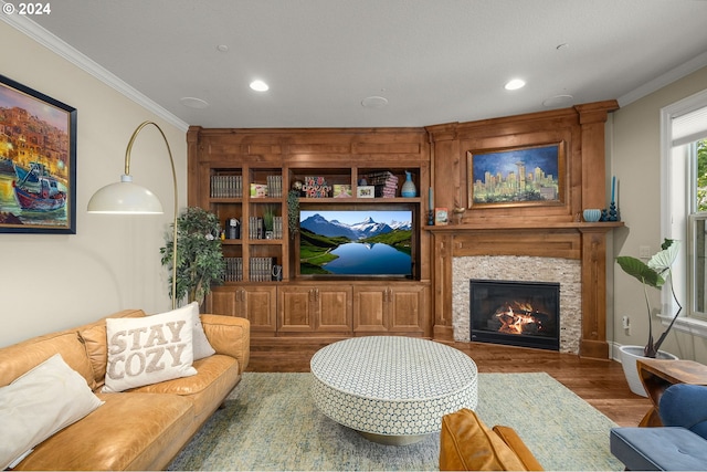 living room featuring crown molding and hardwood / wood-style floors