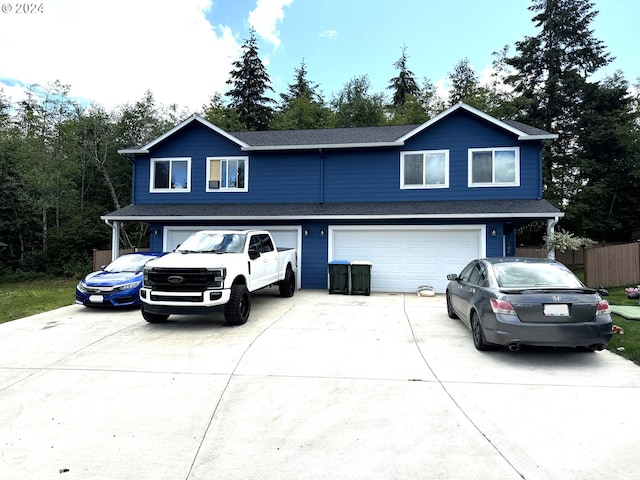 front of property featuring a garage