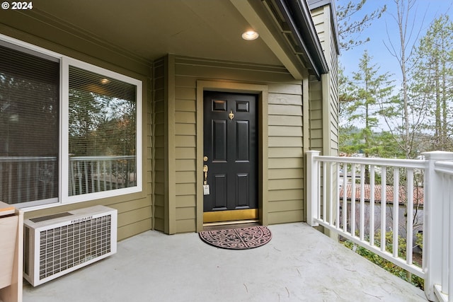 doorway to property with heating unit