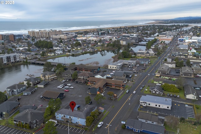 drone / aerial view with a water view