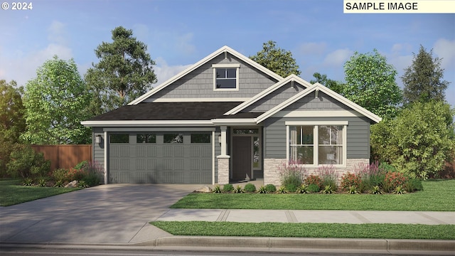 craftsman-style home with a front yard and a garage