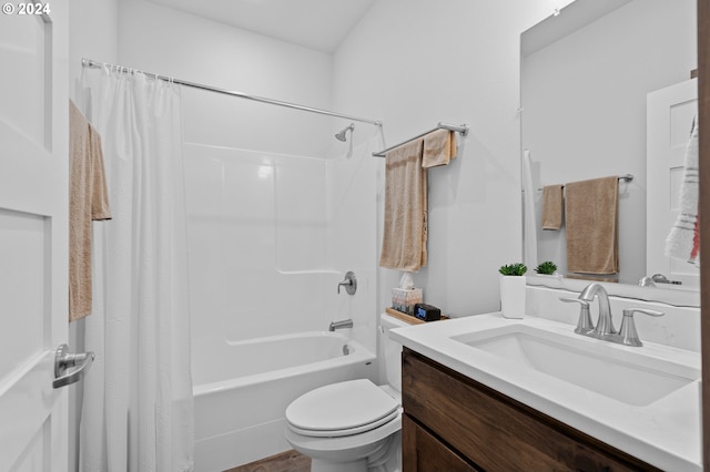 full bathroom featuring vanity, toilet, and shower / bathtub combination with curtain