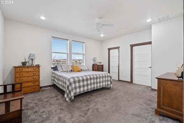 carpeted bedroom featuring ceiling fan