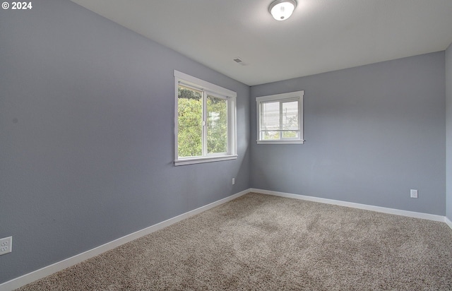 empty room with carpet floors