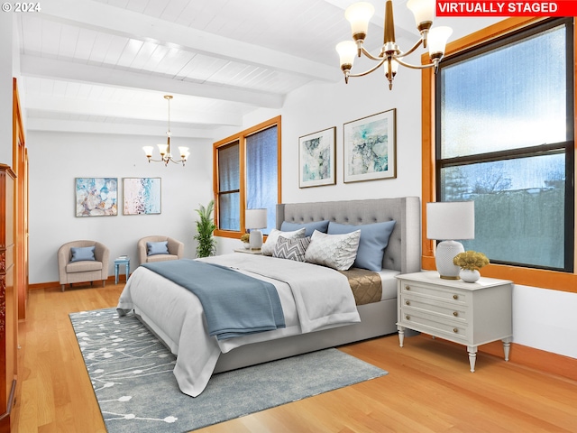 bedroom featuring beam ceiling, light wood-type flooring, and a notable chandelier