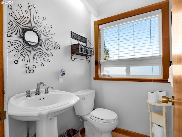 bathroom with toilet and sink