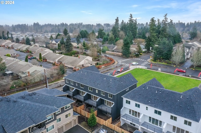 birds eye view of property with a residential view