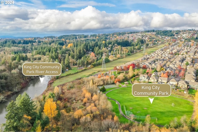 aerial view featuring a water view and a residential view