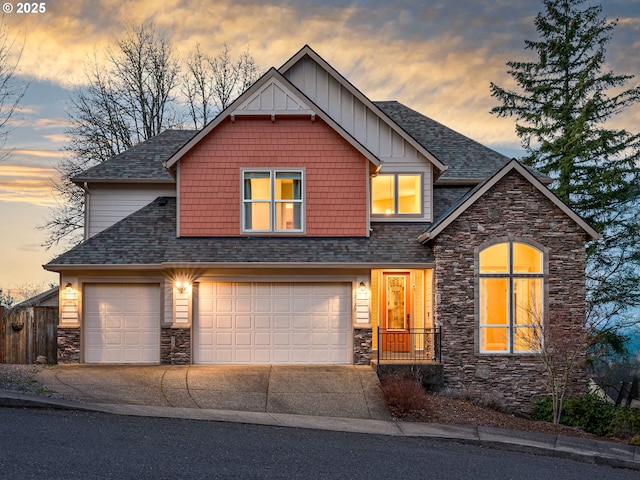 craftsman inspired home with stone siding, board and batten siding, and roof with shingles