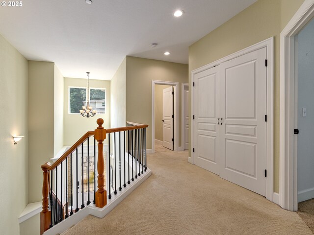 unfurnished living room with carpet floors, lofted ceiling, and a tile fireplace