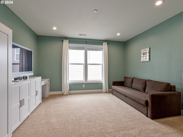 living room with light colored carpet