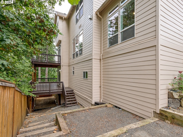 view of home's exterior featuring a deck