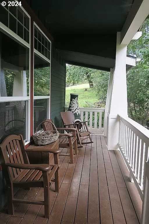 wooden deck featuring a porch