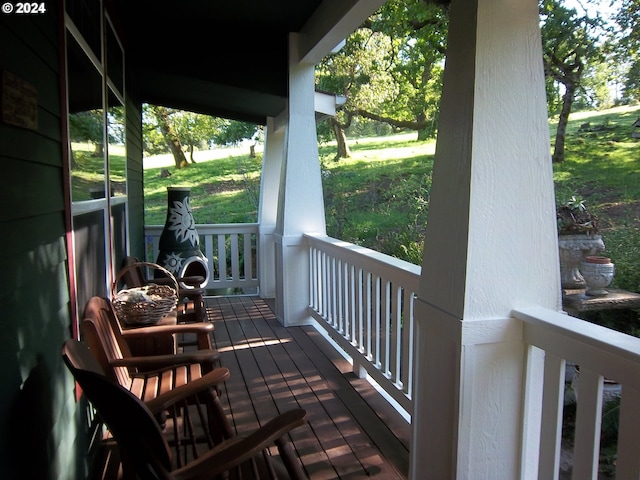 balcony featuring covered porch