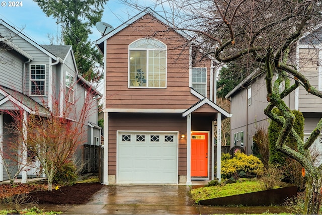 front of property featuring a garage