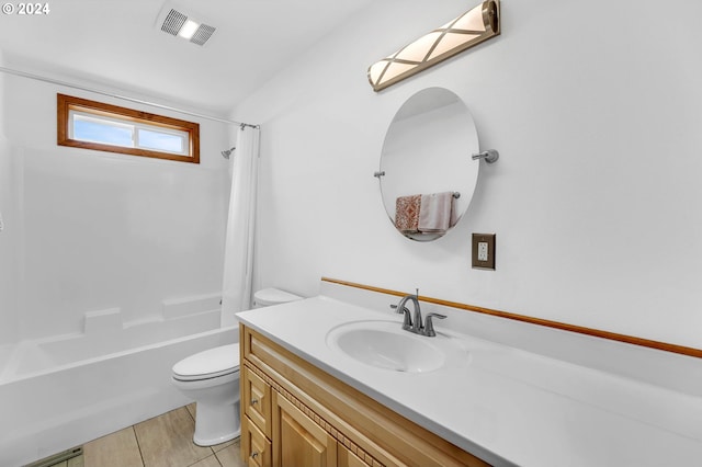 full bathroom featuring shower / washtub combination, toilet, and vanity