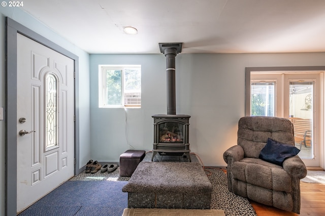 living room featuring a wood stove