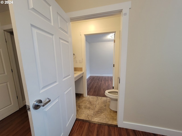 interior space with dark hardwood / wood-style flooring