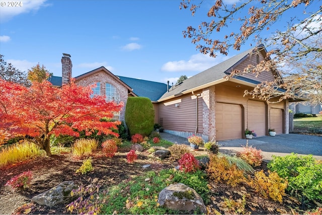 view of front of home with a garage