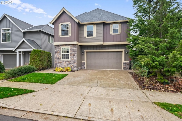 view of front of property with a garage