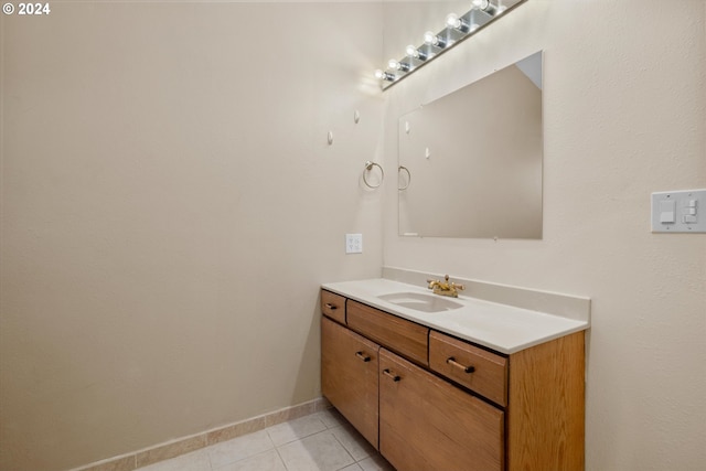 bathroom with vanity and tile patterned flooring