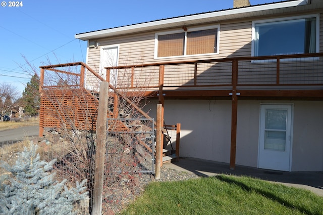 rear view of house with a deck