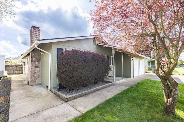 view of home's exterior with a garage