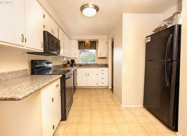 kitchen featuring white cabinets, a textured ceiling, sink, and black appliances