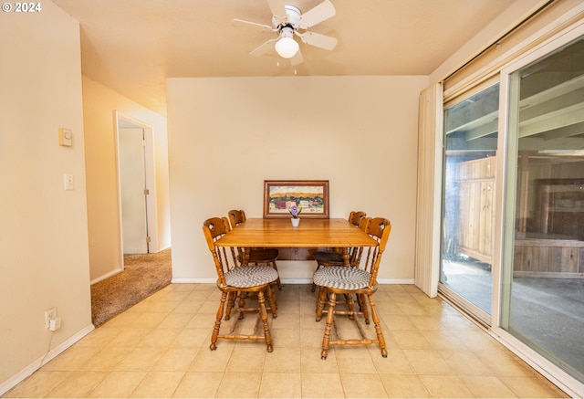 dining space featuring ceiling fan