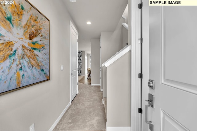 entryway with light hardwood / wood-style floors