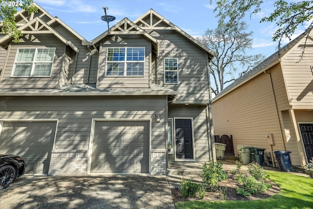 view of front of home with a garage