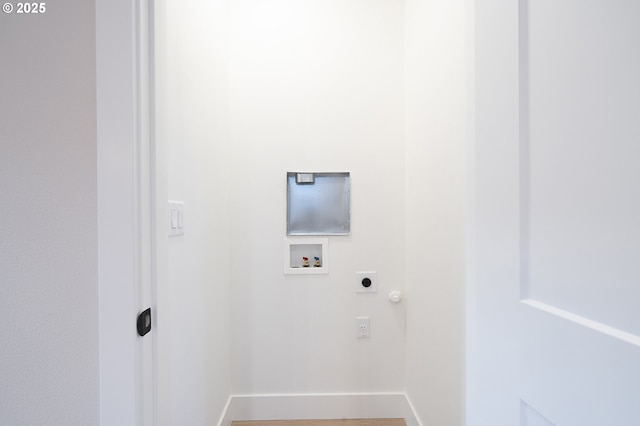 laundry area featuring electric dryer hookup and washer hookup