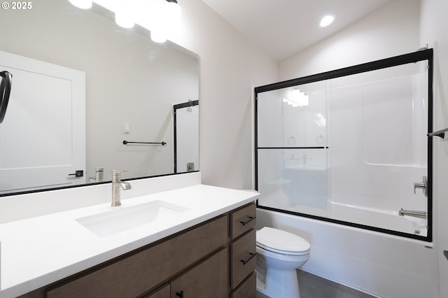 full bathroom with vanity, toilet, and combined bath / shower with glass door