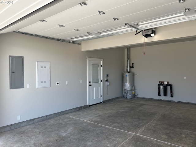 garage with gas water heater, electric panel, and a garage door opener