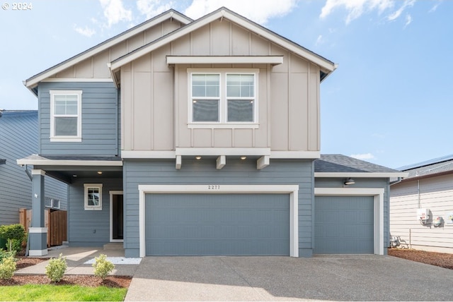 view of front of property featuring a garage