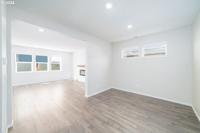 spare room featuring hardwood / wood-style floors