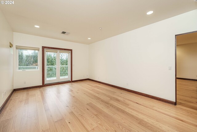 spacious closet featuring hardwood / wood-style floors