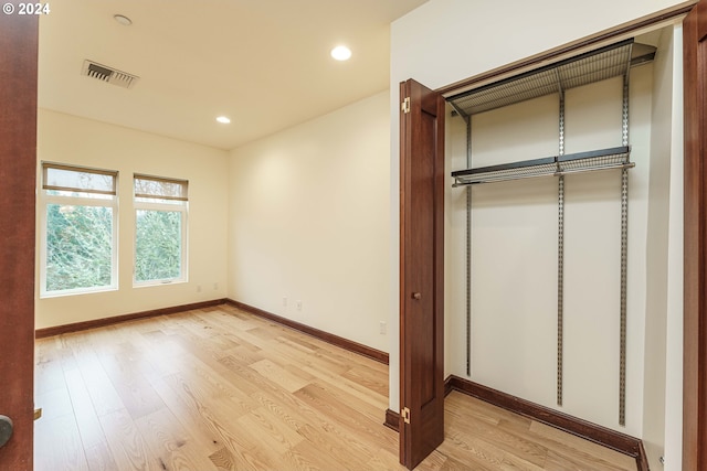 unfurnished bedroom featuring light hardwood / wood-style flooring