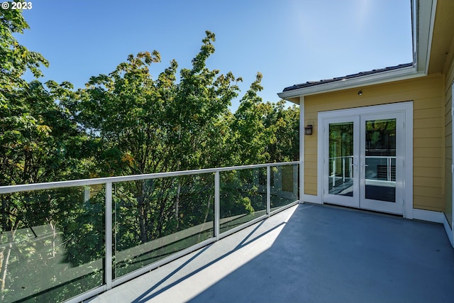 balcony featuring french doors