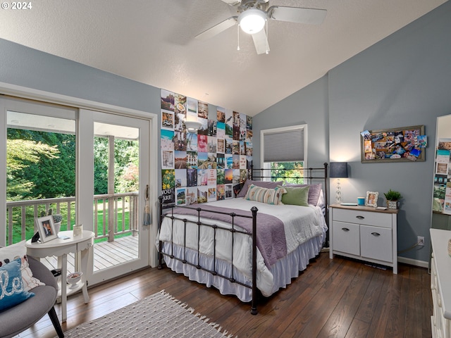 bedroom featuring ceiling fan, vaulted ceiling, dark hardwood / wood-style floors, and access to exterior