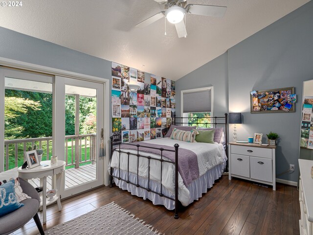 bedroom featuring access to exterior, vaulted ceiling, dark hardwood / wood-style floors, and ceiling fan